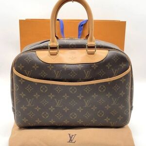 Auth Louis Vuitton Monogram
Deauville Handbag W/DBag
